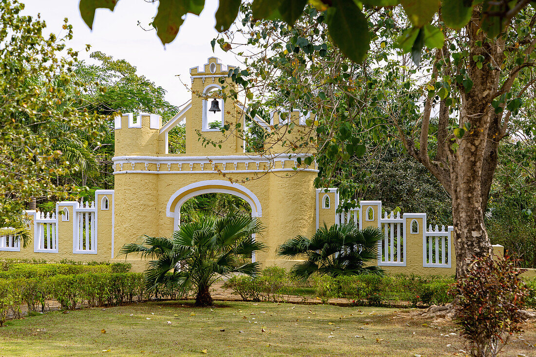 historic entrance gate of the Roça Belo Monte Hotel on the island of Principé in West Africa