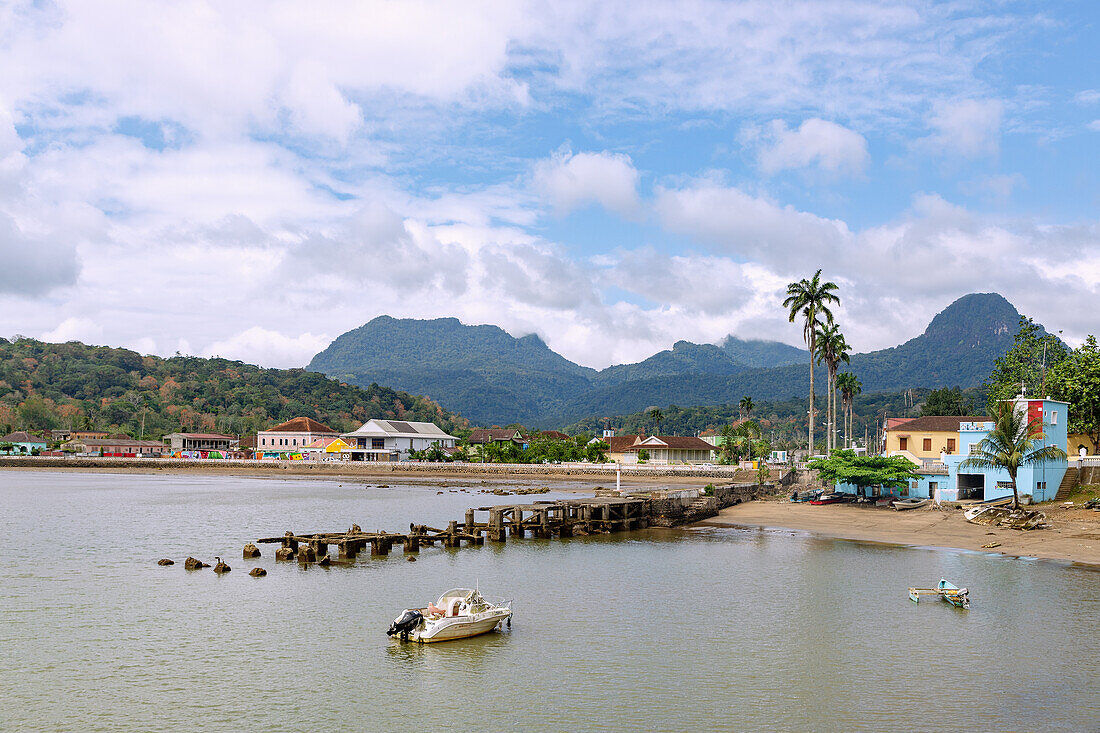 Island capital Santo António with port and view of Pico Papagaio on the island of Principé in West Africa