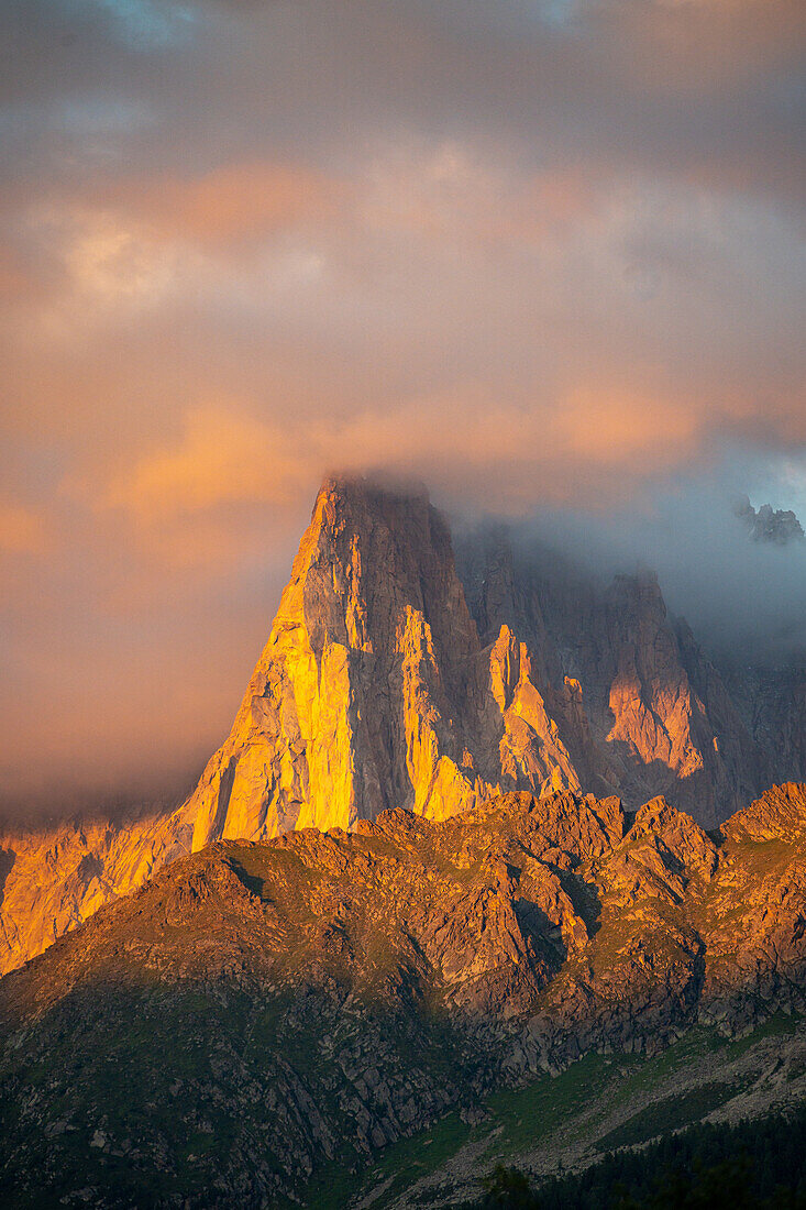 Massif with Aiguille Verte and Aiguille du Dru in the golden evening light, Chmaonix Mont Blanc
