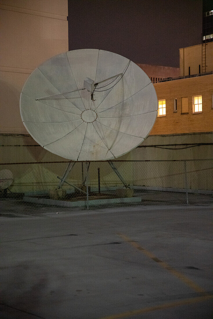 Parabolic antenna on a rooftop
