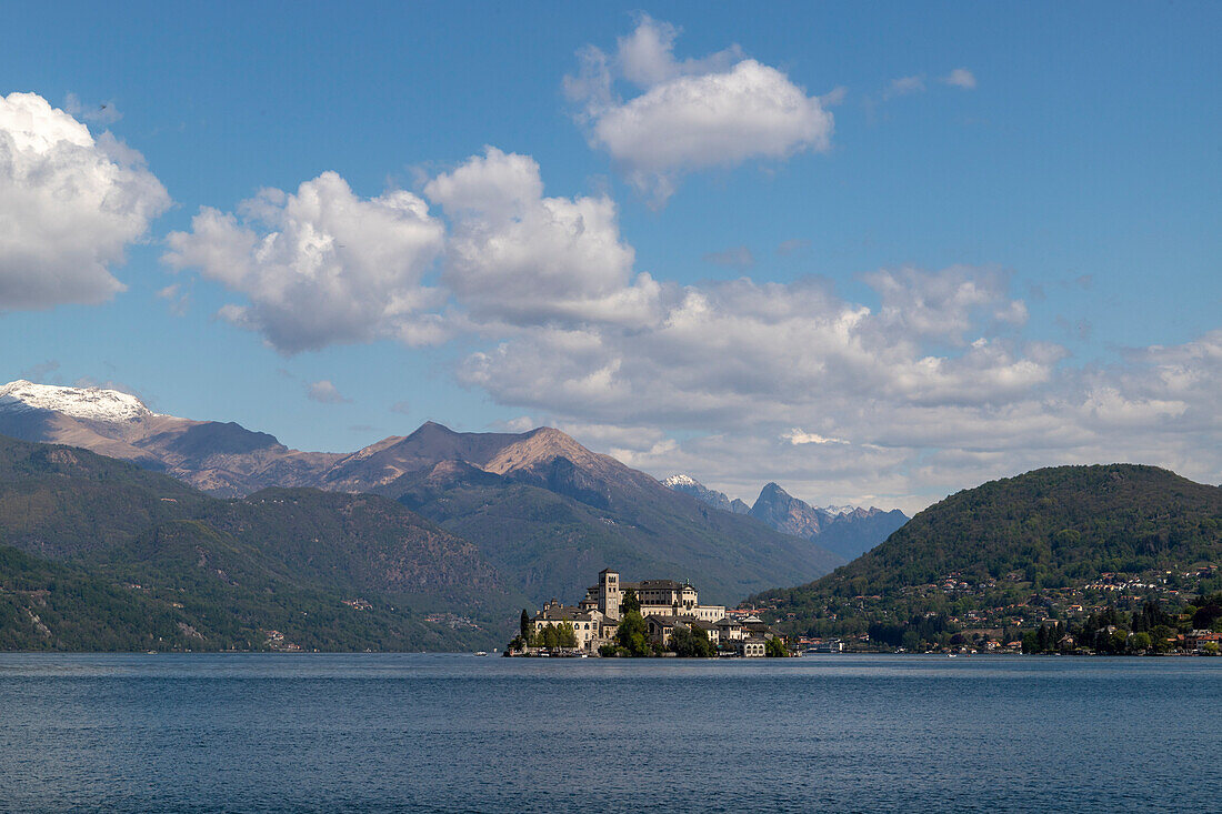 View over Lake Orta from the western shore to Isola San Giulio, Novara, Piedmont, Italy.