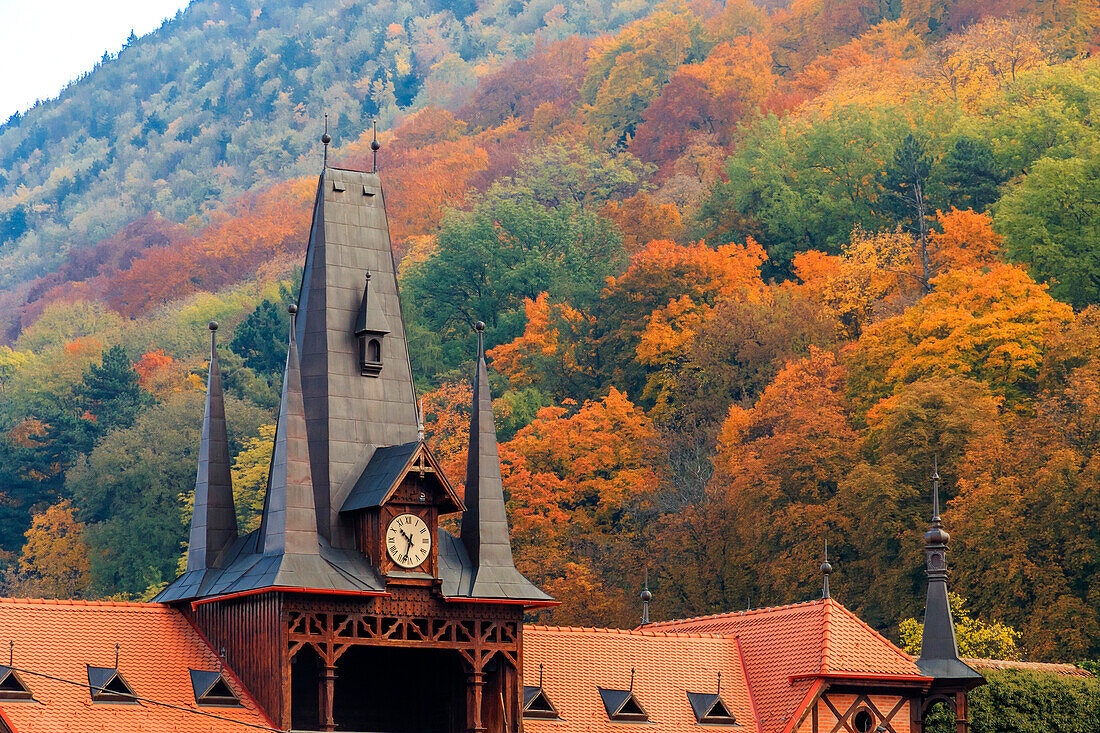 Romania, Brasov. Poarta Schei district. Olimpia Restaurant near George Street. Clock Tower, spires.