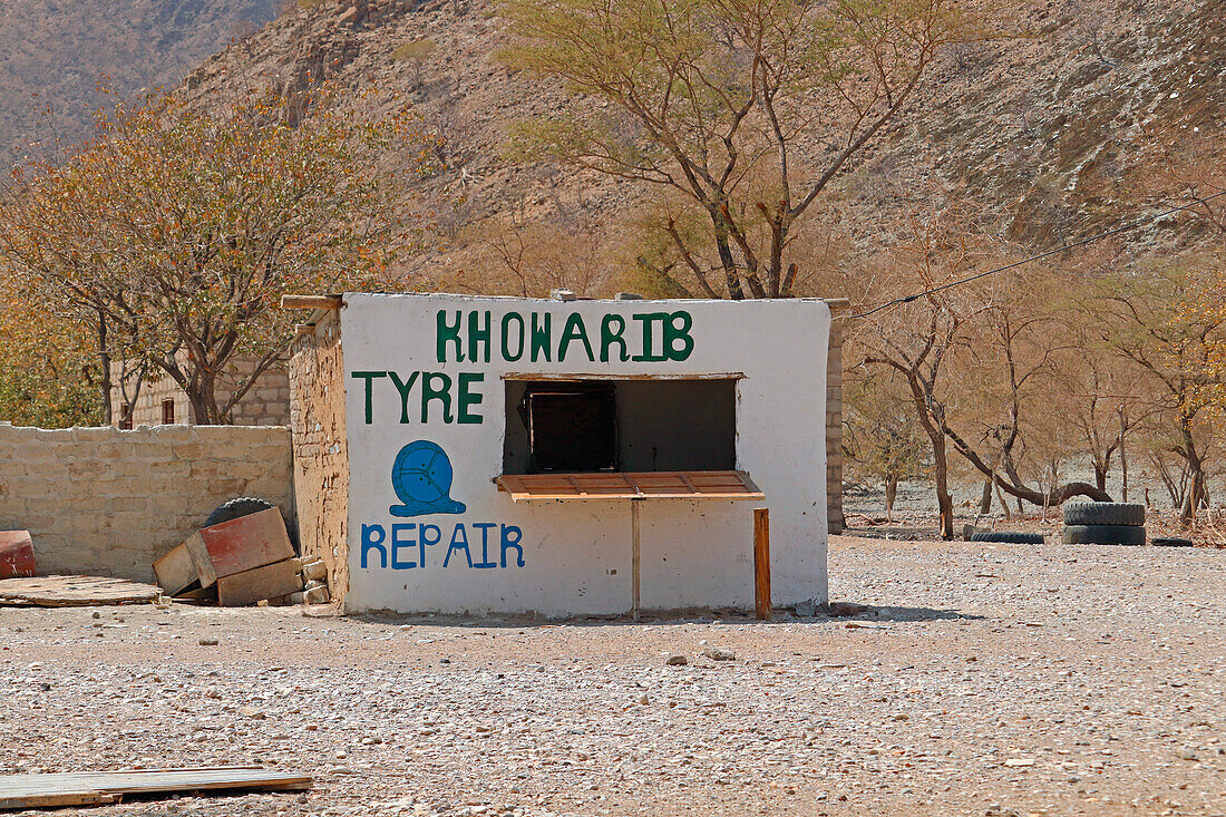 Namibia; Kunene Region; northern Namibia; at Khowarib on the C43 between Palmwag and Opuwo; Roadside tire repair workshop