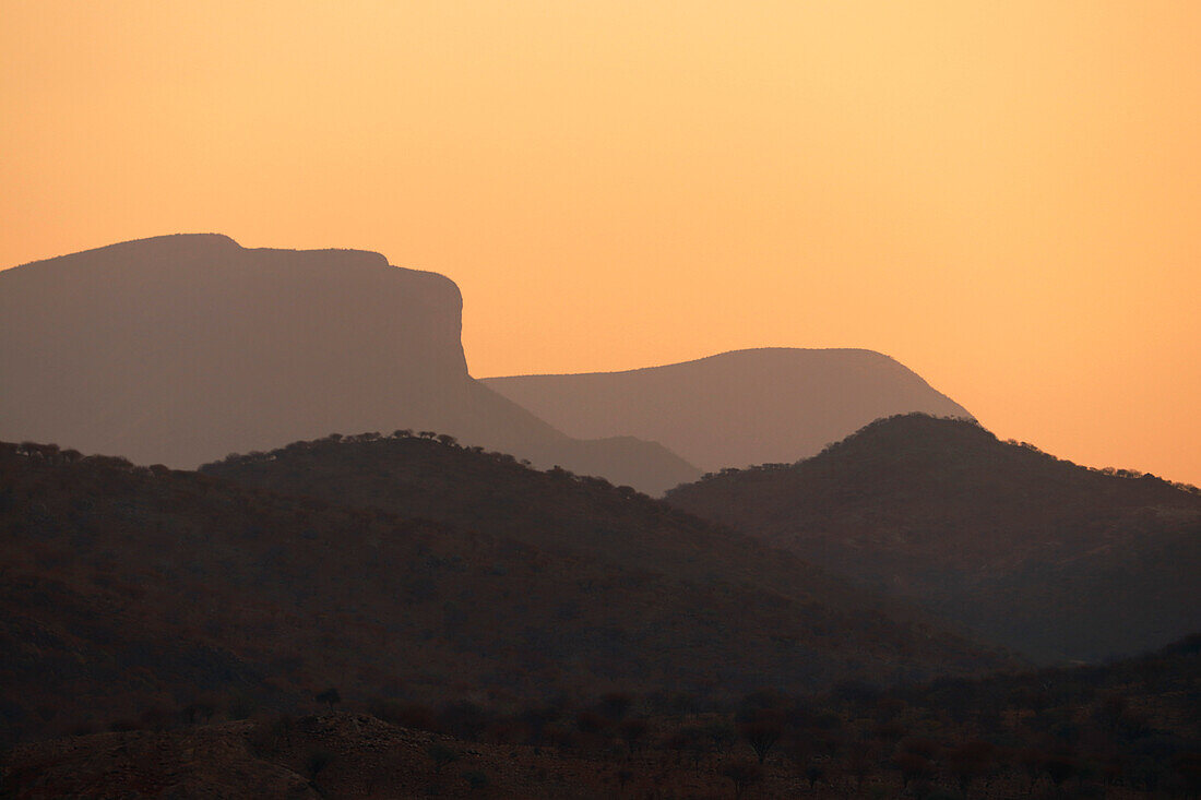 Namibia; Kunene region; northern Namibia; Kaokoveld; at Epupa; mountains in the sunset