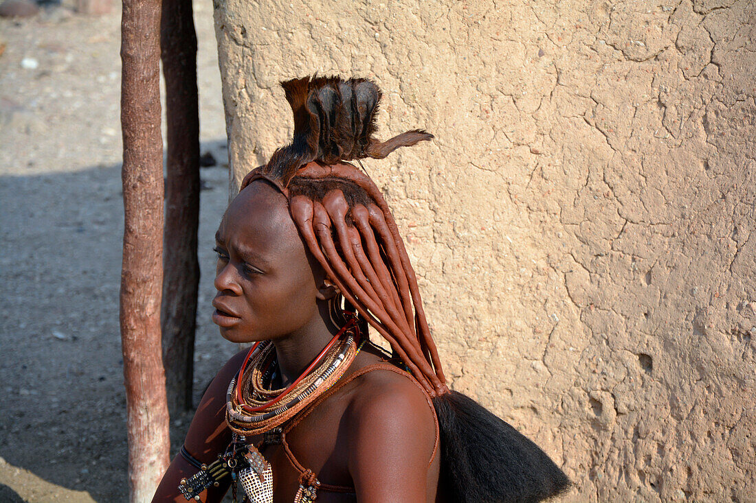 Namibia; Kunene Region; northern Namibia; Kaokoveld; young Himba woman in a village on the Kunene River