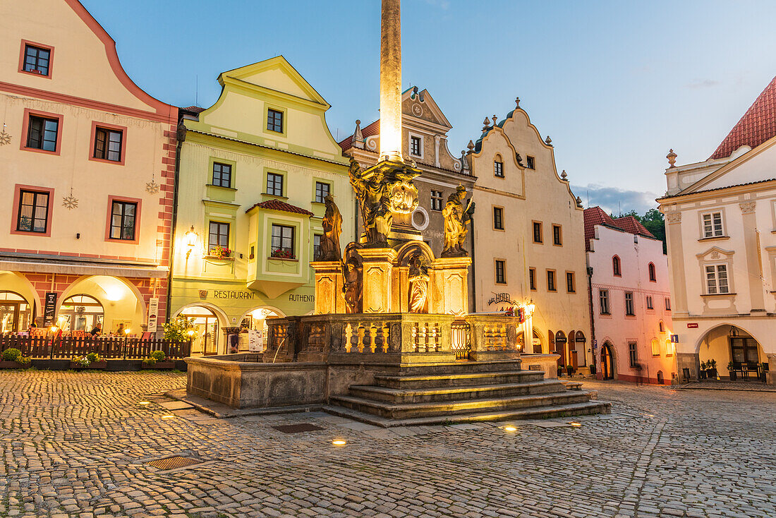 Town Square with Marian Column in Cesky Krumlov, South Bohemia, Czech Republic at night
