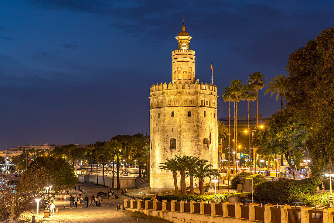 The historic Torre del Oro tower at dusk, Seville, Andalusia, Spain