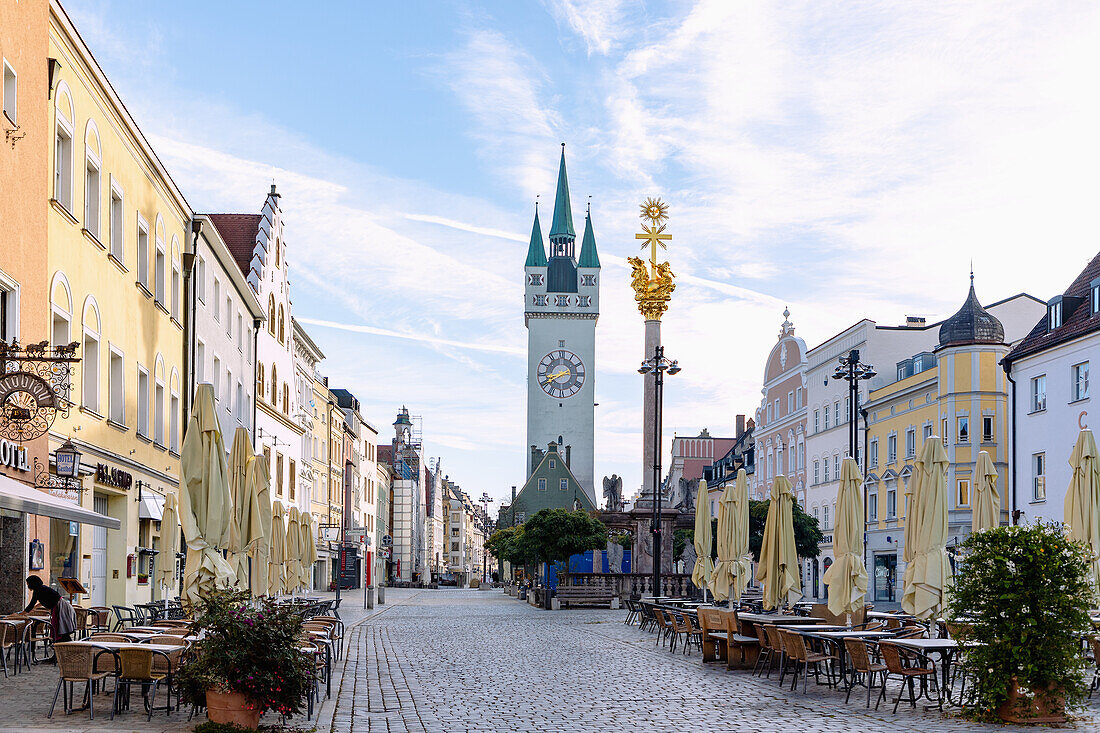 Theresienplatz with Trinity Column, Fountain of St. Tiburtius and view of the city tower in Straubing in Lower Bavaria in Germany