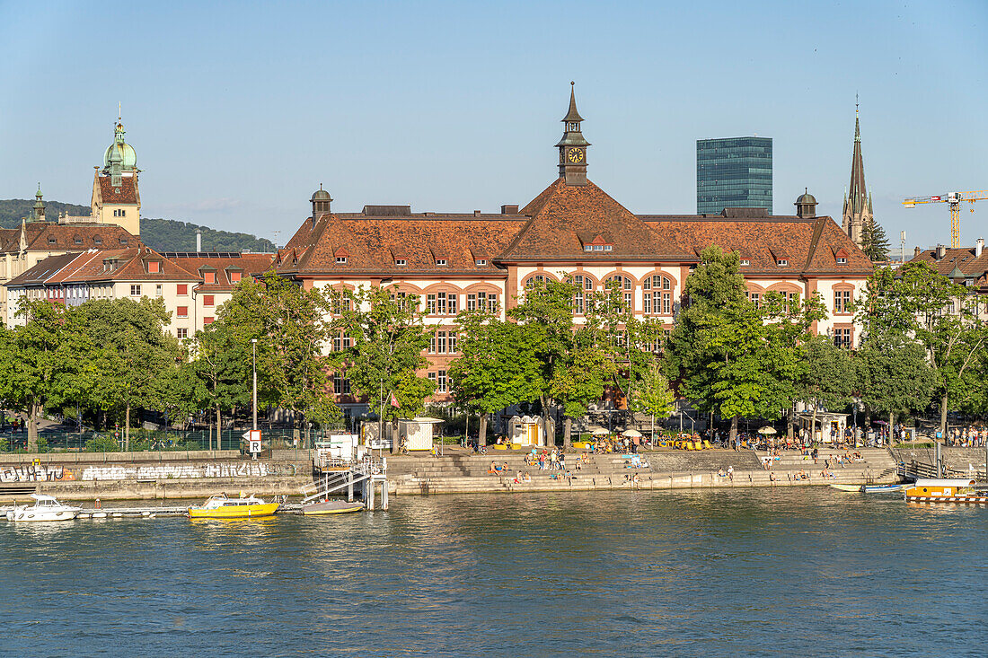 Theobald-Baerwart school building in Kleinbasel and the Rhine river in Basel, Switzerland, Europe