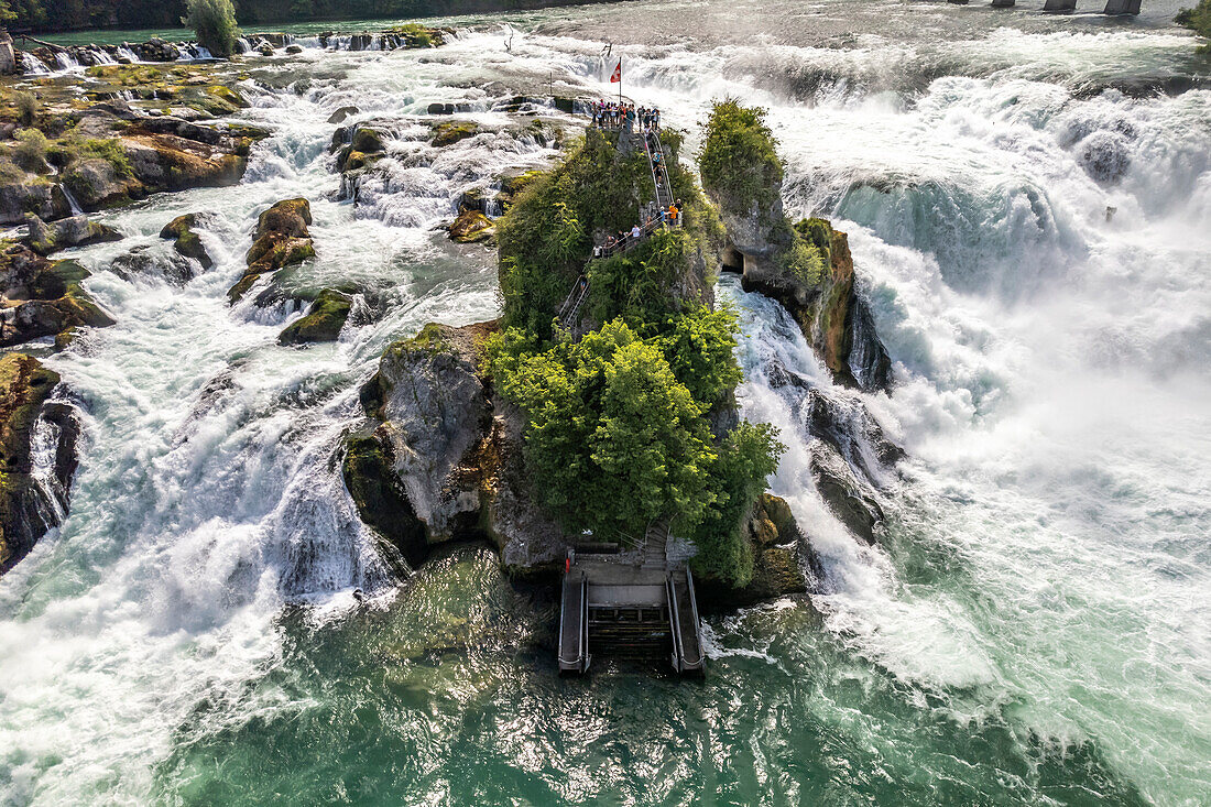 Visitors on the rock in the Rheinfall waterfall, Neuhausen am Rheinfall, Switzerland, Europe