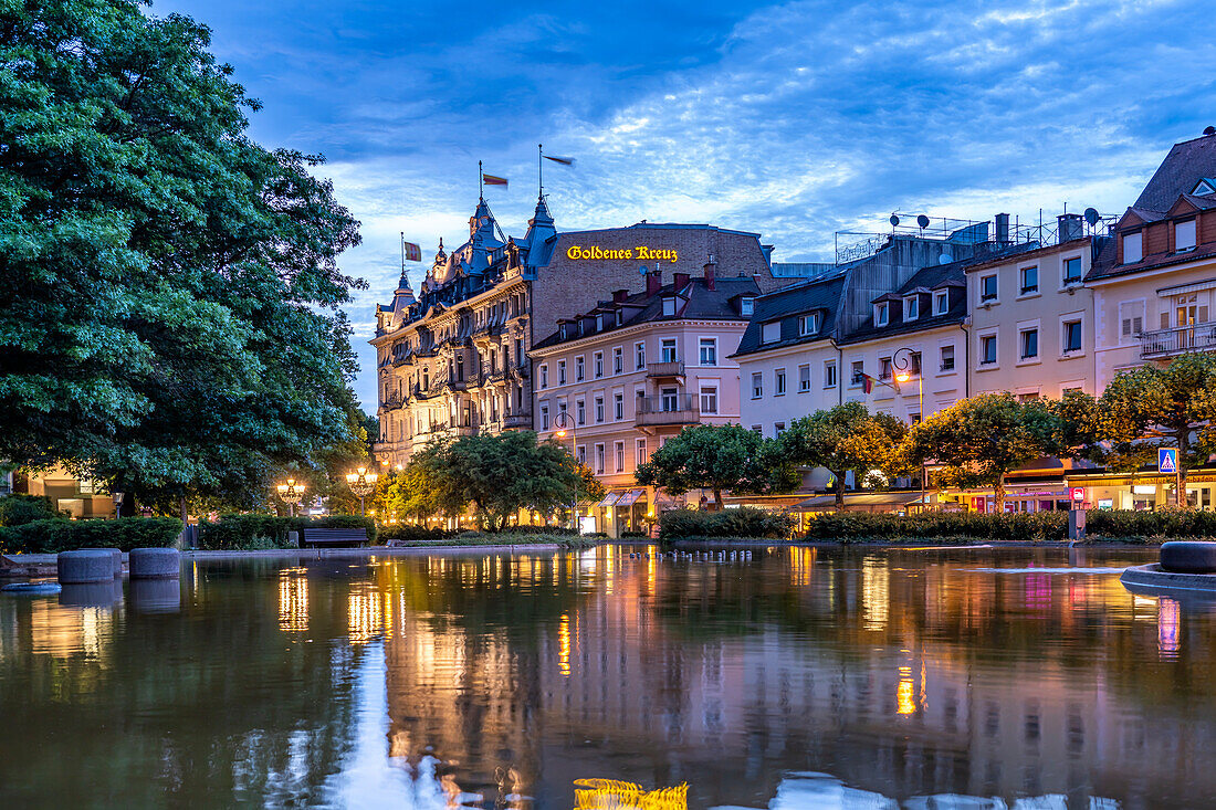 The historic residential and commercial building Goldenes Kreuz at dusk Baden-Baden, Baden-Württemberg, Germany