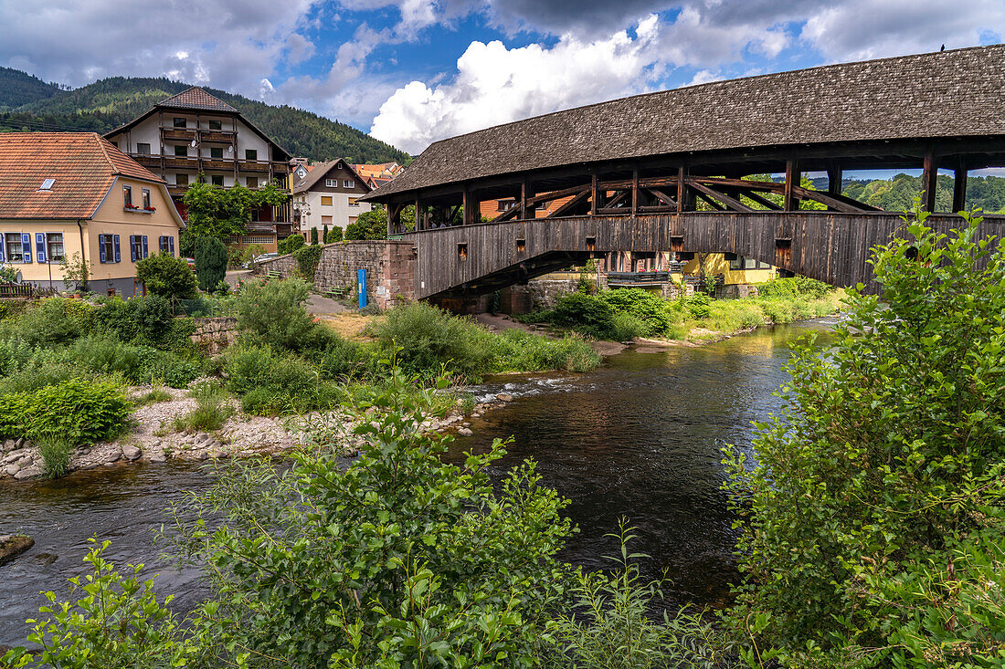 The covered wooden bridge over the Murg River in Forbach, Murg Valley, Black Forest, Baden-Württemberg, Germany