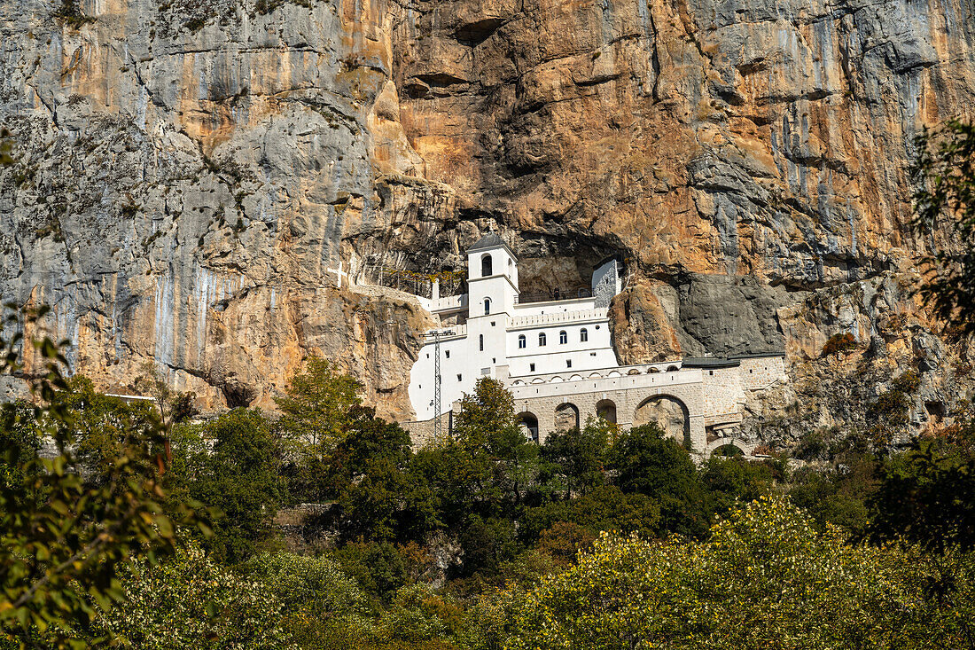 The Serbian Orthodox Ostrog Monastery perched high in a cliff, Montenegro, Europe