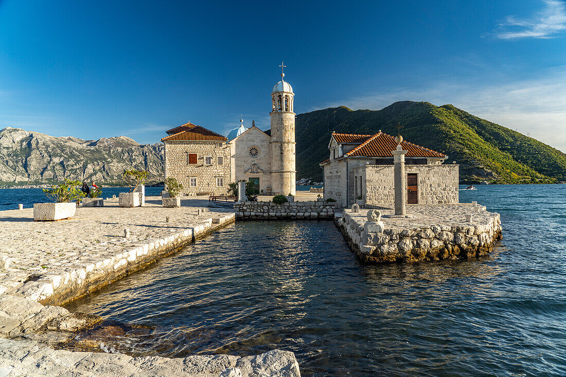 The artificial island of Gospa od Skrpjela with the Church of St. Mary on the Rock near Perast on the Bay of Kotor, Montenegro, Europe