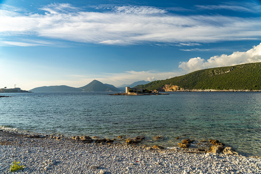 Plaža Arza beach and Otocic Gospa island in the Bay of Kotor, Montenegro, Europe
