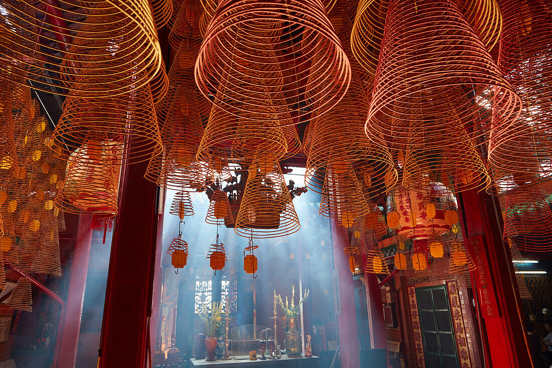 Smoke and incense coils, inside Ong Pagoda, Can Tho, Mekong Delta, Vietnam