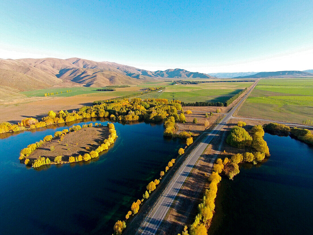 Wairepo Arm, State Highway 8, and Kellands Pond, Lake Ruataniwha, near Twizel, Mackenzie District, South Canterbury, South Island, New Zealand, drone aerial