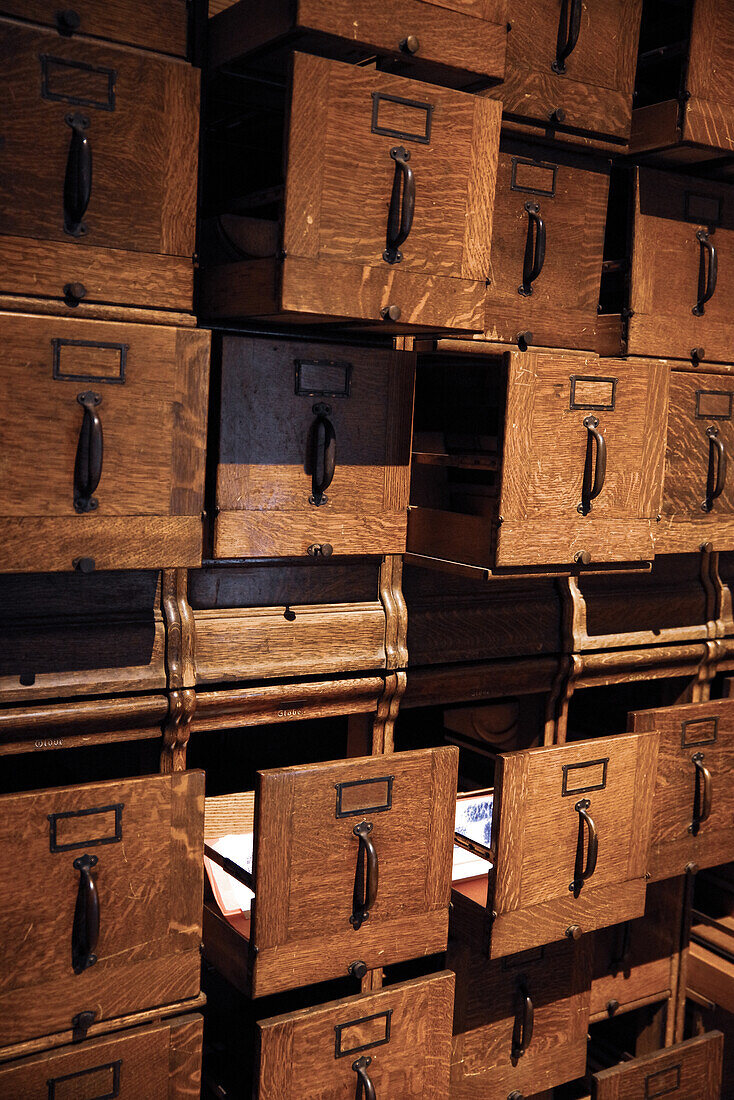 Old wooden filing cabinets in a former psychic ward.