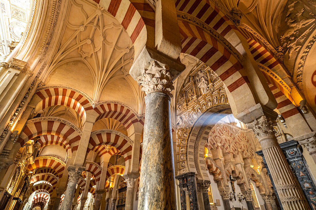 Moorish columns and arches in the interior of the Mezquita - Catedral de Cordoba in Cordoba, Andalusia, Spain