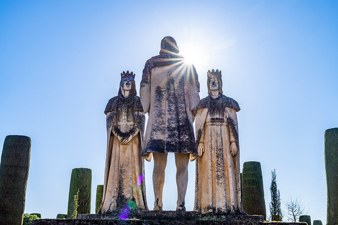 Statues of Queen Isabella, King Ferdinand and Christopher Columbus, Promenade of the Kings, Alcazar de los Reyes Cristianos in Cordoba, Andalusia, Spain