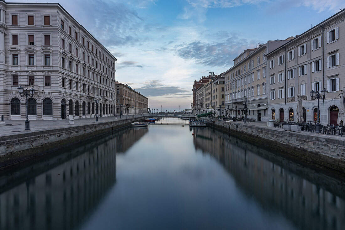 View towards the sea across the Grand Canal in Trieste, Friuli Venezia Giulia, Italy.