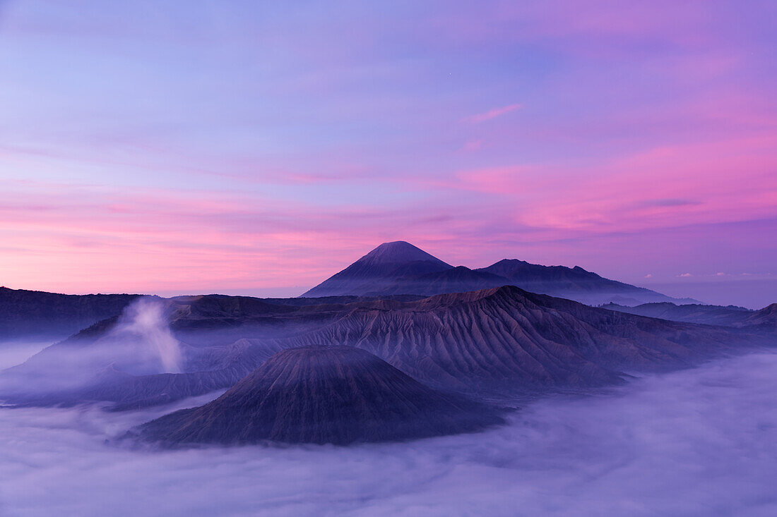 Blue hour over the volcanoes of Bromo Tengger Semeru National Park, Java, Indonesia.