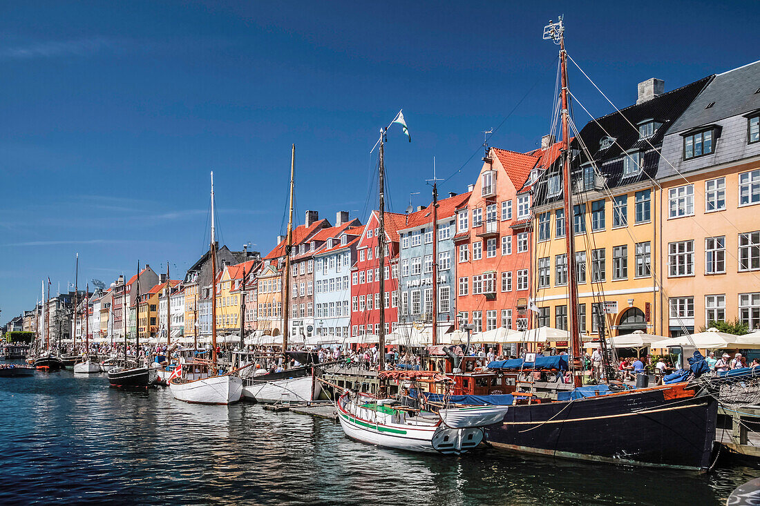 Old ships and colorful houses in Nyhavn in Copenhagen, Denmark