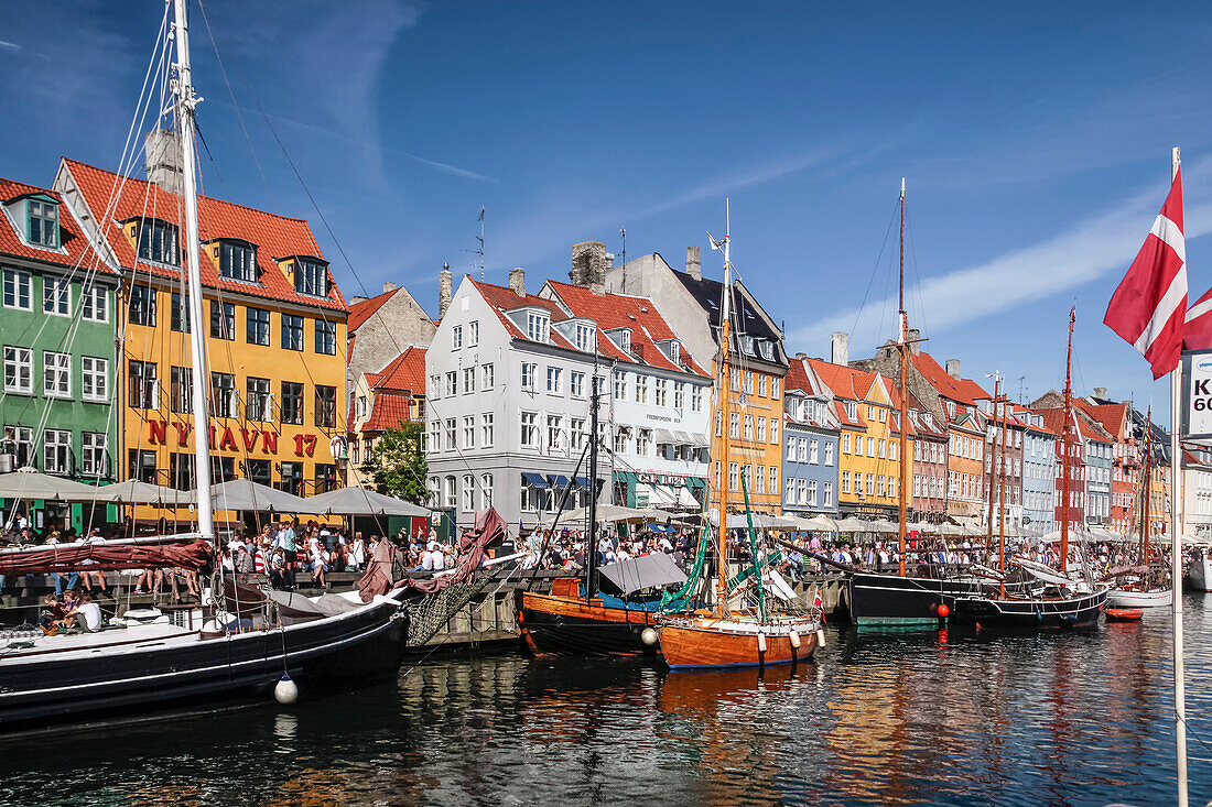 Old ships and colorful houses in Nyhavn in Copenhagen, Denmark