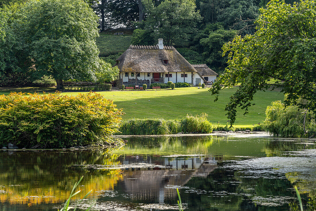 Schweizerhaus and Liselund Slotspark, landscape garden of the country house Liselund Castle, Mon island, Denmark, Europe