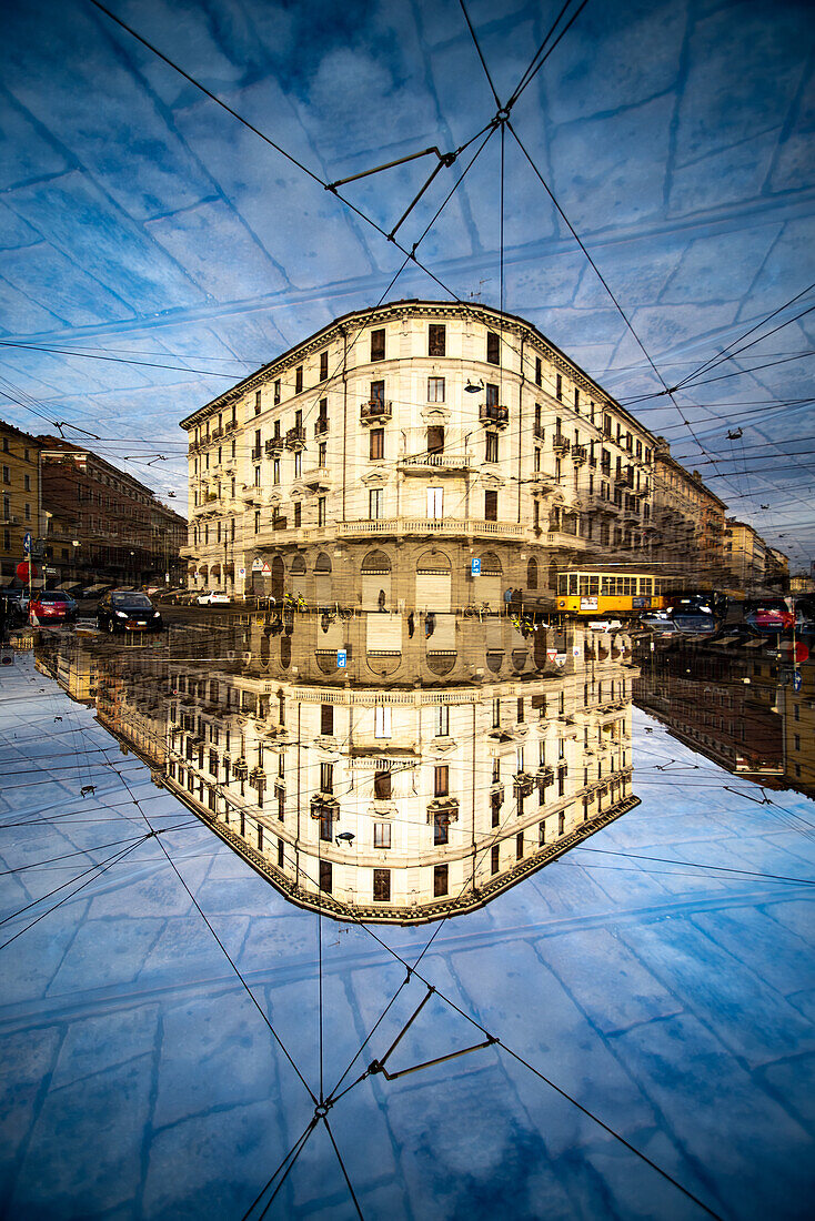 A corner building in the Porta Genova district in Milan, Italy.