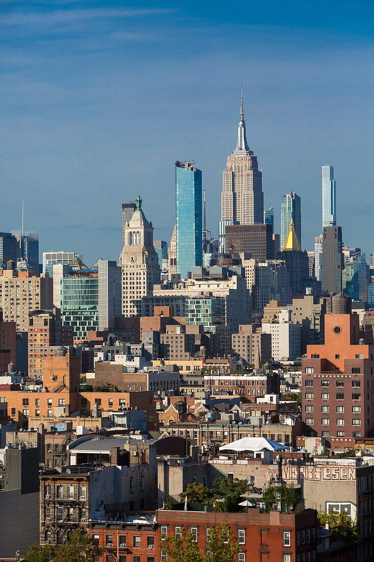 View from the Lower East Side of the Midtown skyline with the Empire State Building, Manhattan, New York, New York, USA