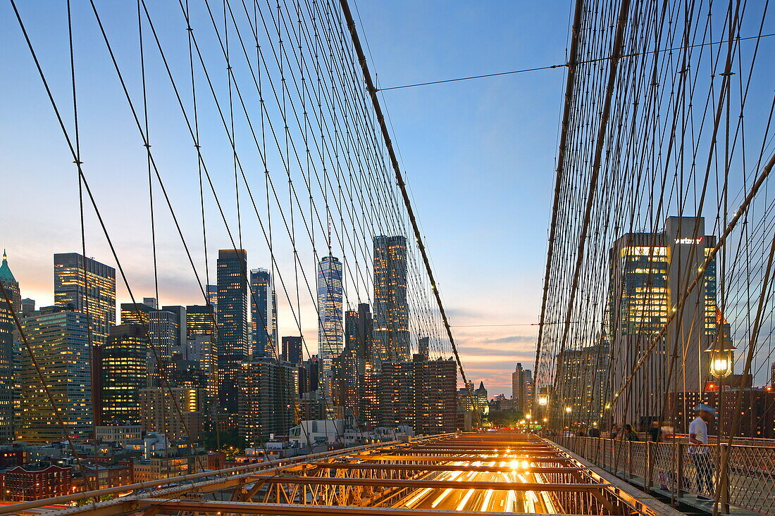 Brooklyn Bridge with the Financial District skyline of downtown Manhattan, New York, New York, USA