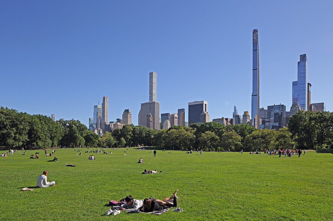 Sheep Meadow in Central Park with the &#39;Pencil'39; skyscrapers of Billionaire Row (57 Street), Manhattan, New York, New York, USA