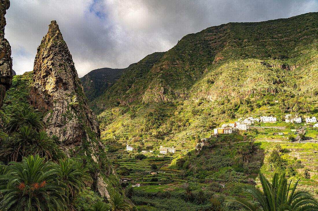 One of the twin rocks Roques de San Pedro, landmark of Hermigua, La Gomera, Canary Islands, Spain