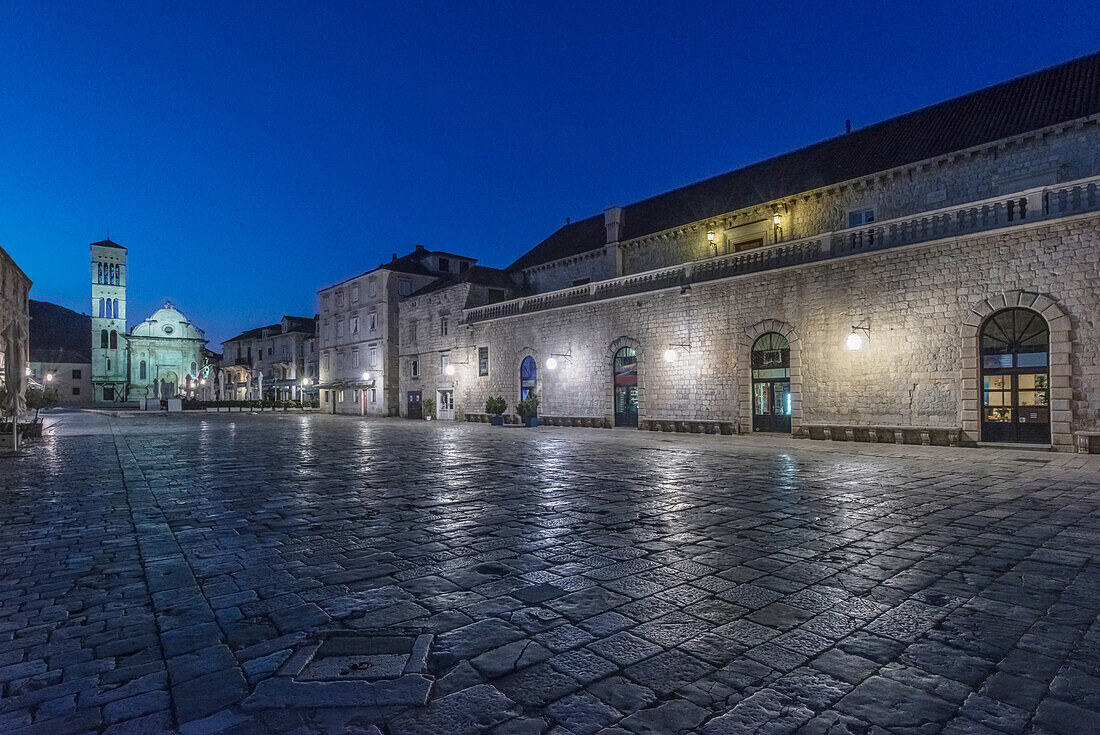 St. Stephen's Square in Hvar lit up at night.