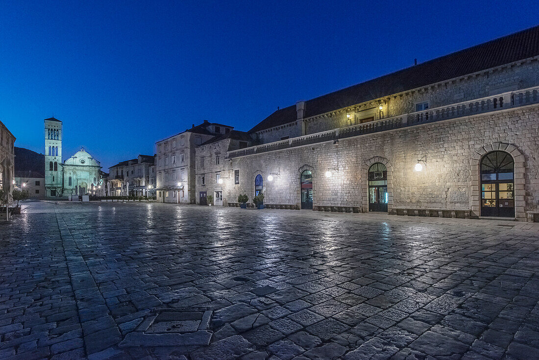 St. Stephen's Square in Hvar lit up at night.