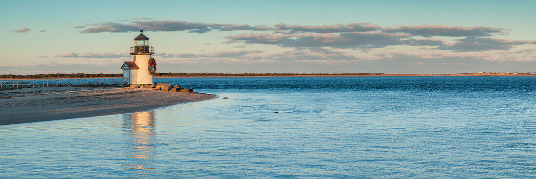 USA, New England, Massachusetts, Nantucket Island, Nantucket Town, Brant Point Lighthouse with a Christmas wreath, dusk