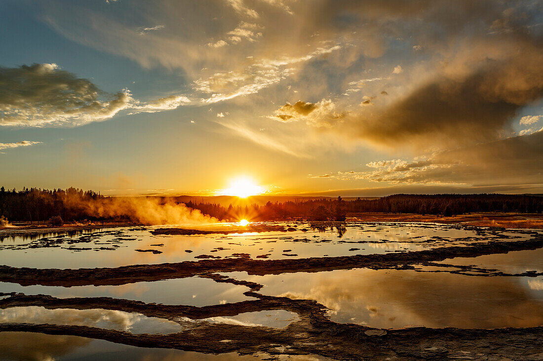 Great Fountain Geyser at sunset, Lower Geyser Basin, Yellowstone National Park, Wyoming.