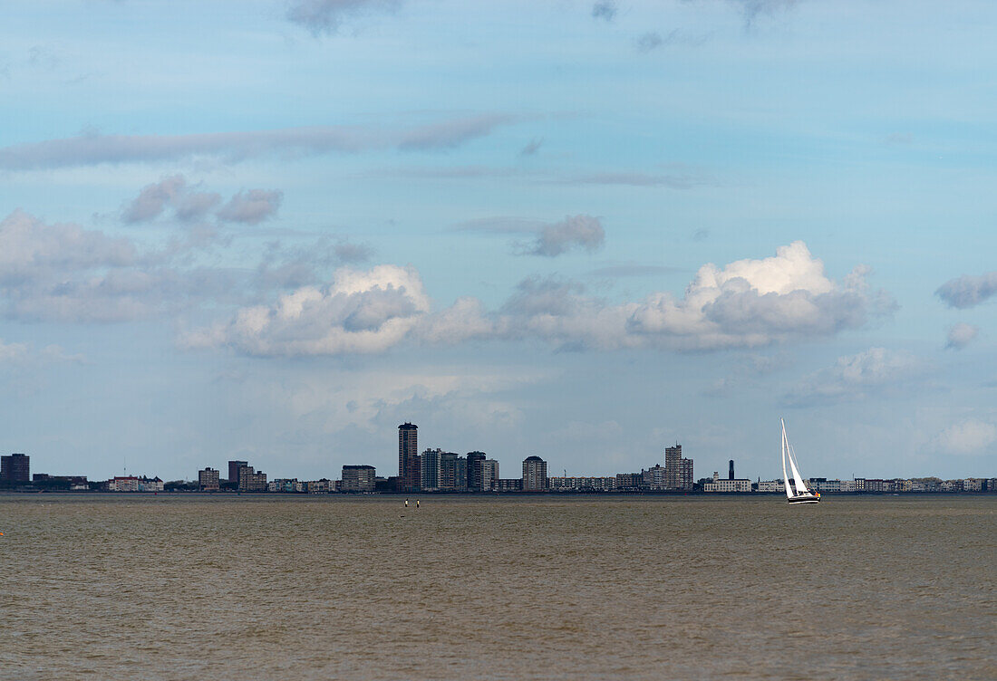 A sailboat on the North Sea between city of Vlissingen and the beach of Groede in the Zeeland province of the Netherlands.