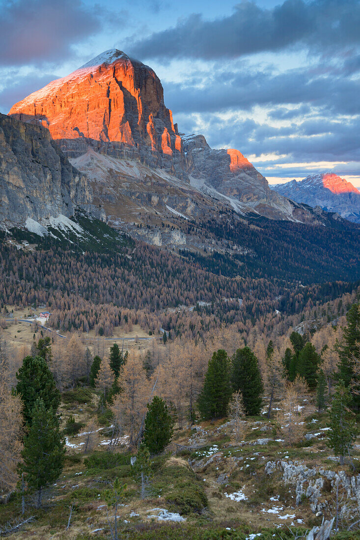 Last rays of sun at Passo Falzarego with a view of the mountains of the Dolomites.