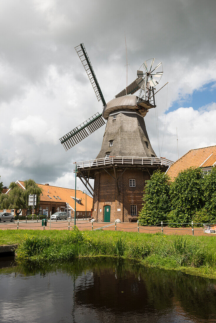 Canal with windmill, Westgrossefehn, Großefehn, East Friesland, Lower Saxony, Germany