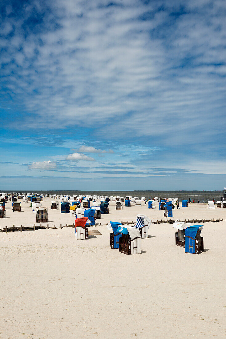 Beach chairs on the sandy beach, Harlesiel, Carolinensiel, East Frisia, Lower Saxony, North Sea, Germany