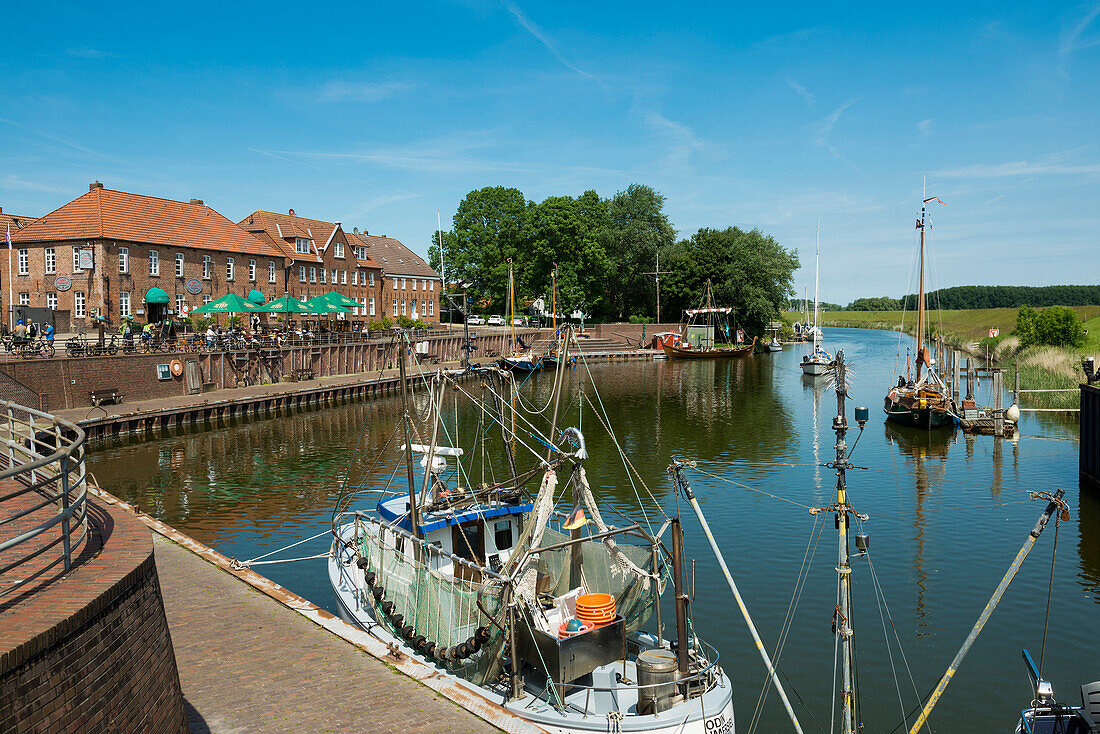 Old harbor with warehouses, Hooksiel, Wangerland, East Frisia, Lower Saxony, North Sea, Germany