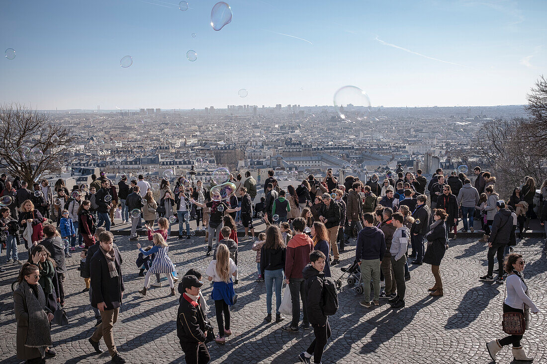 Panoramic view from Basilica &quot;Sacré-Cœur de Montmartre&quot; on the capital Paris, soap bubbles, Ile de France, France