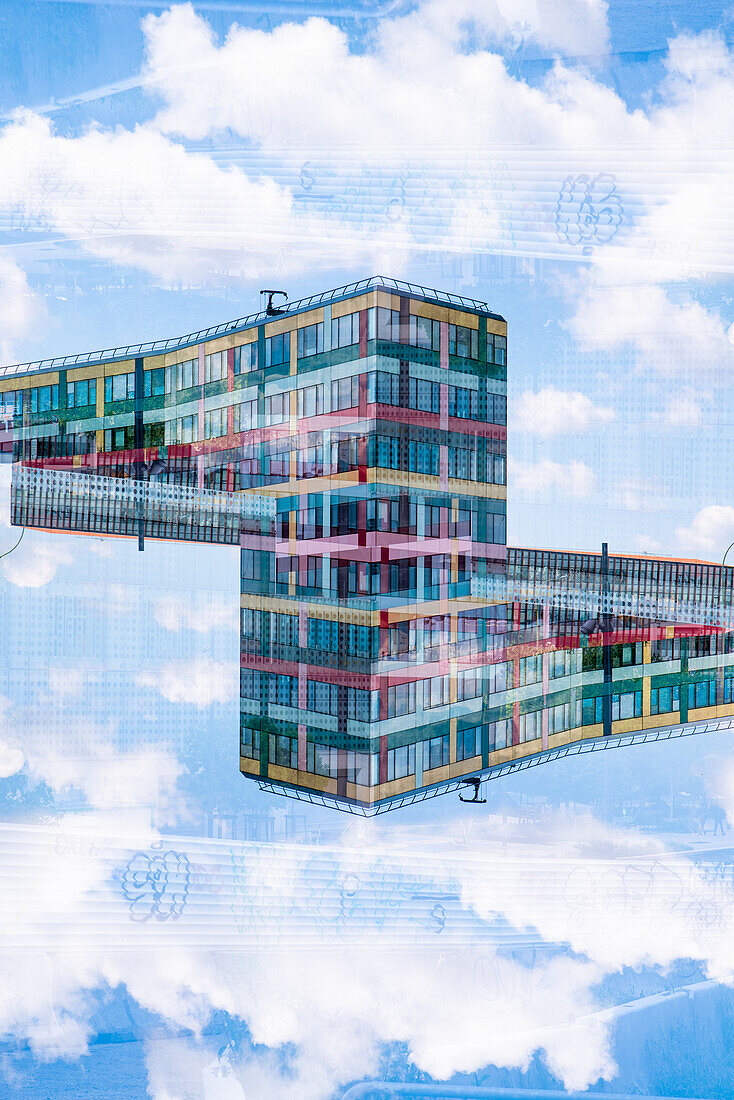 Double exposure of colorful modern architectural residential buildings along the canal de Saint-Denis as seen from the Quai de l'Allier in Paris, France.