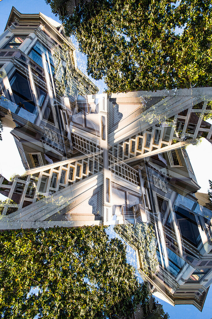 Double exposure of a Victorian style colorful wooden residential building on Hayes street in San Francisco, California.