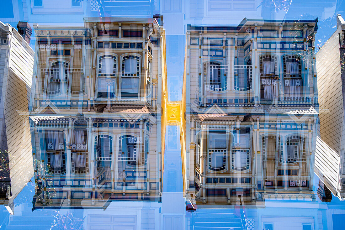 Doppelbelichtung eines farbenfrohen Wohngebäudes aus Holz im viktorianischen Stil im berühmten Missionsviertel in San Francisco, Kalifornien.