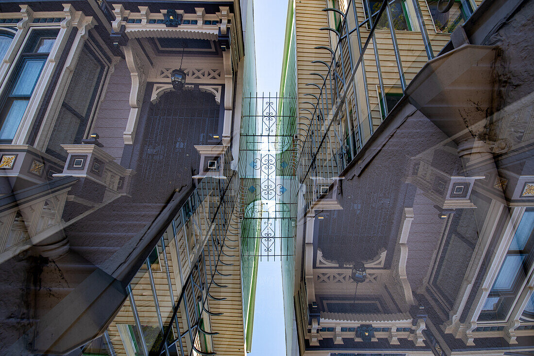 Double exposure of a wooden residential building in the famous mission district in San Francisco, California.