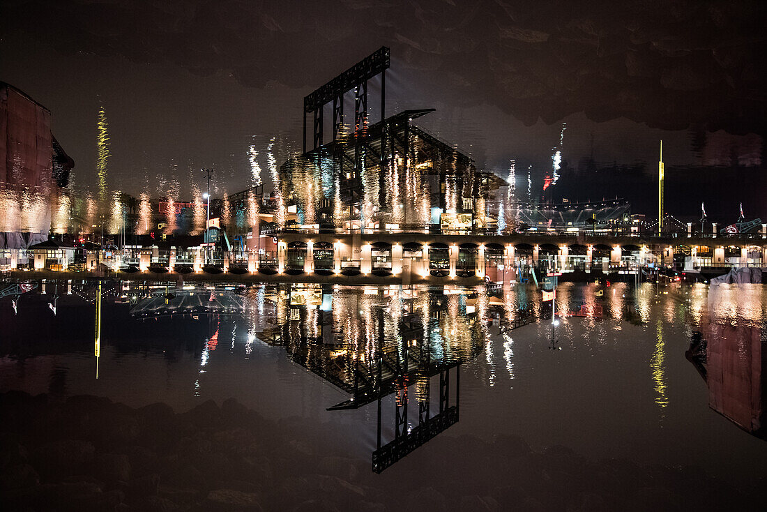 Double exposure of the Oracle Park Football stadium in San Francisco, California.