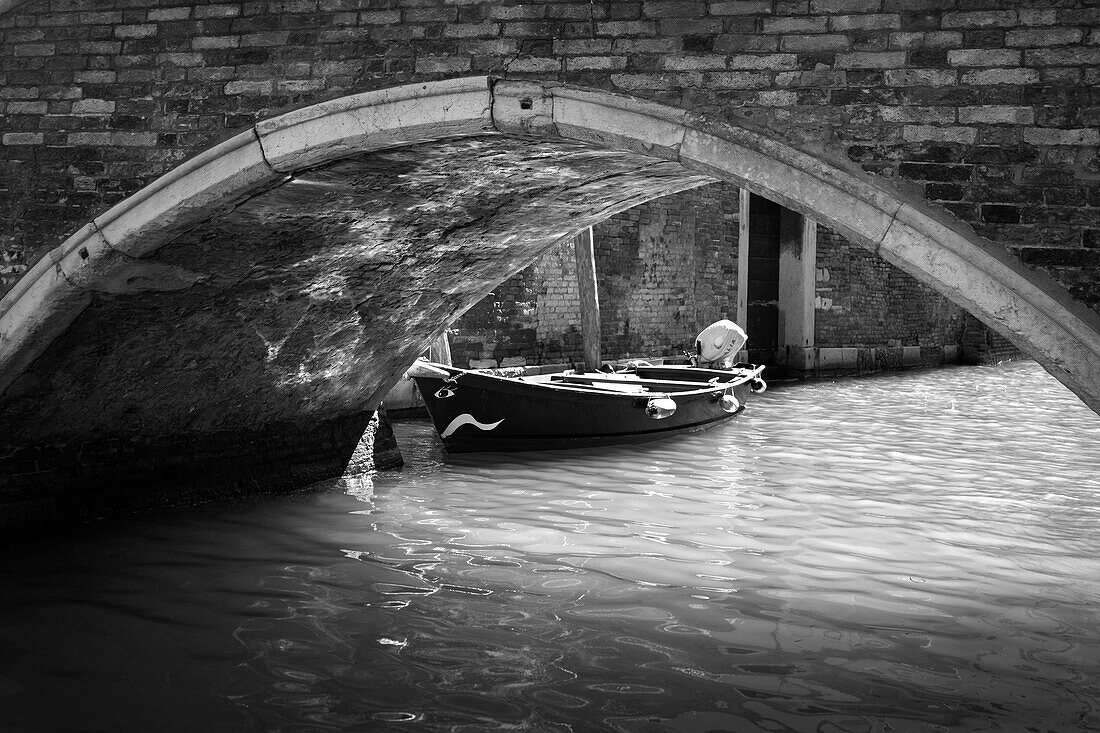 View of a boat in a canal in Venice, Dorsoduro, San Polo, Venezia, Veneto, Italy, Europe